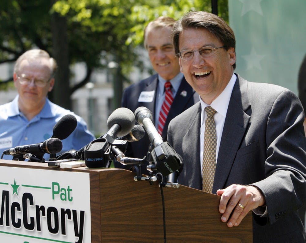 Republican nominee for Governor Pat McCrory, right, speaks to the crowd while his opponents in the primary, Bob Orr, left, and Fred Smith listen during a press conference/rally in downtown Raleigh, North Carolina Wednesday, May 7, 2008. (Chris Seward/Raleigh News & Observer/MCT)