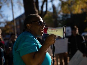 Dorothy Faulkner, 55, of Chapel Hill, addresses a crowd gathered during a CEF-organized rally to call for affordable housing in front of the Community Empowerment Fund office on Friday, Nov. 1, 2019. "It's in my heart to serve the Lord," Faulkner sung after her speech.