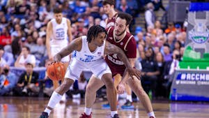 UNC junior guard Caleb Love (2) dribbles the ball during the game against Boston College at the 2023 New York Life ACC Men's Basketball Tournament on Wednesday, March 8, 2023, at the Greensboro Coliseum. UNC beat Boston College 85-61.
