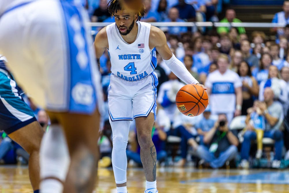 UNC junior guard RJ Davis dribbles the ball during the men's basketball game against UNCW in the Dean Smith Center on Monday, Nov. 4, 2022.