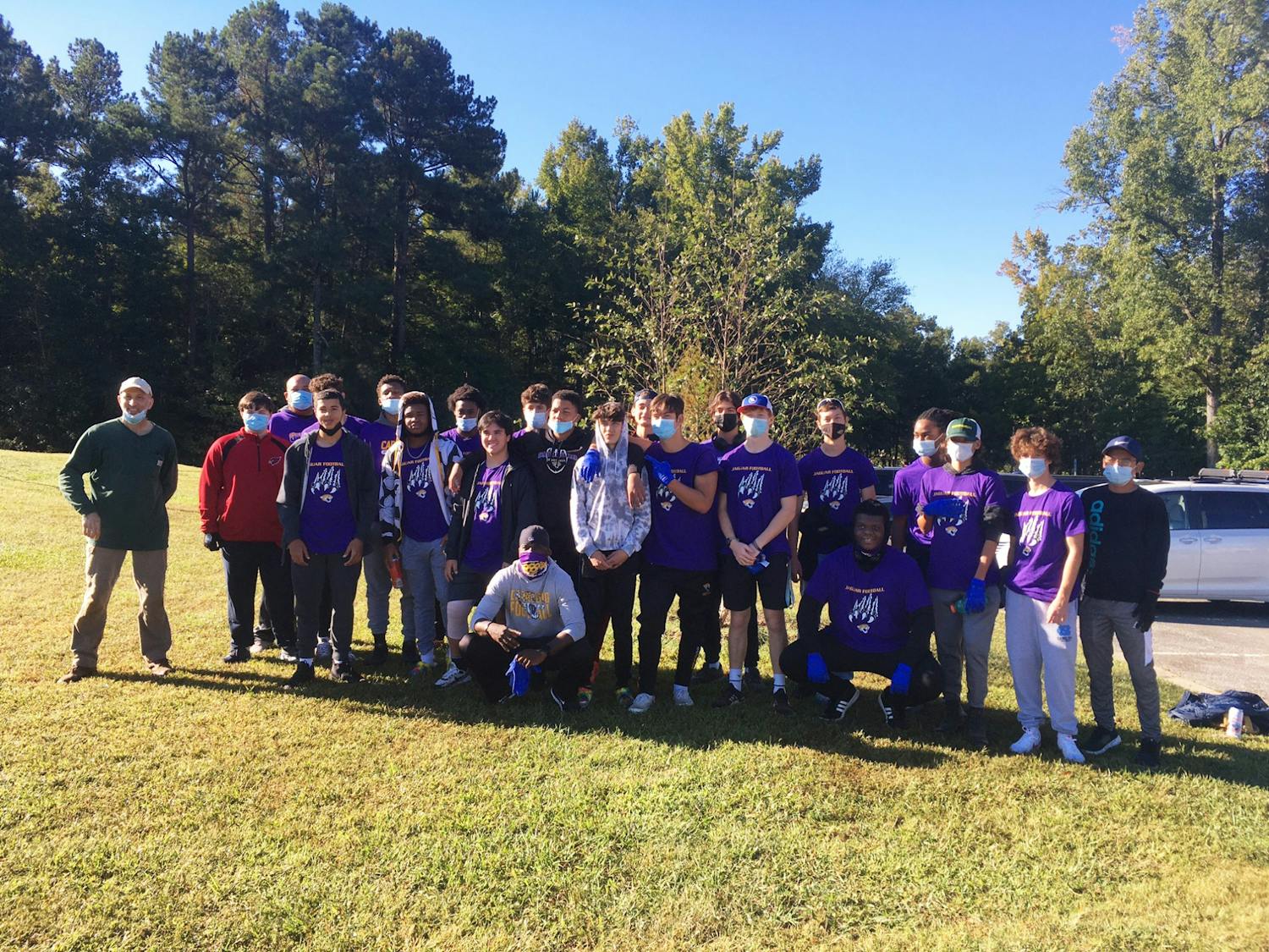 The Carrboro High School Football Team pitched in to remove invasive privet from Anderson Park in fall 2021. Photo courtesy of Catherine Lazorko/Town of Carrboro