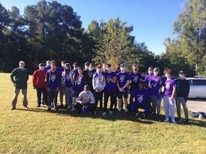 The Carrboro High School Football Team pitched in to remove invasive privet from Anderson Park in fall 2021. Photo courtesy of Catherine Lazorko/Town of Carrboro