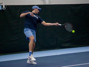 UNC graduate Ryan Seggerman hits a ball during a match against Oklahoma State at the Cone-Kenfield Tennis Center on Saturday, Jan. 28, 2023. UNC beat Oklahoma State 4-0.
