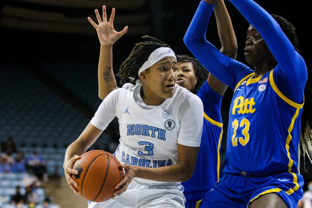 Sophomore guard Kennedy Todd-Williams (3) looks for a teammate to pass to at the women's basketball game against Pittsburgh on Feb. 10, 2022 at Carmichael Arena in Chapel Hill.
