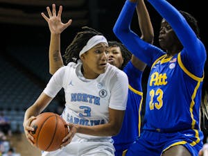 Sophomore guard Kennedy Todd-Williams (3) looks for a teammate to pass to at the women's basketball game against Pittsburgh on Feb. 10, 2022 at Carmichael Arena in Chapel Hill.