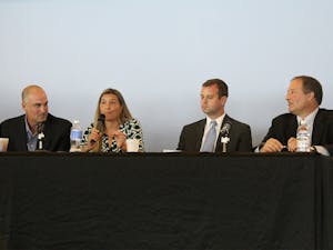 (From left to right) A panel including Jay Bilas, Barbara Osborne, Paul Pogge and Kenneth Hammer met on Wednesday evening in the Blue Zone in Kenan Stadium to discuss the recent O'Bannon v. NCAA court decision.