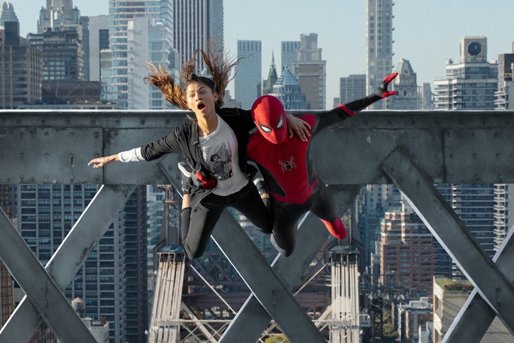 MJ (Zendaya) and Spider-Man (Tom Holland) jump off a bridge in "Spider-Man: No Way Home." Photo courtesy of Matt Kennedy/Sony Pictures/TNS.