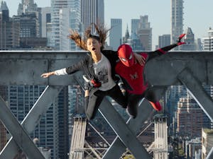 MJ (Zendaya) and Spider-Man (Tom Holland) jump off a bridge in "Spider-Man: No Way Home." Photo courtesy of Matt Kennedy/Sony Pictures/TNS.