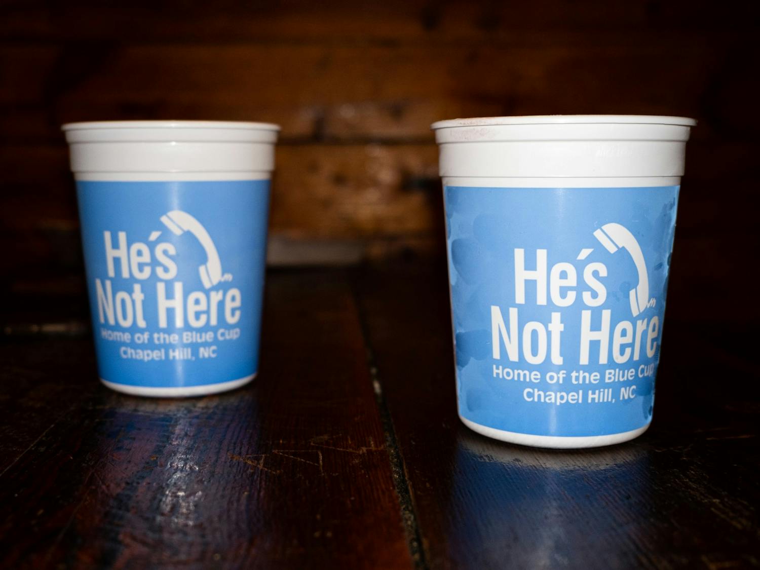 Blue Cups, a signature of the Chapel Hill bar He's Not Here, are pictured on April 15, 2023. He's Not Here is a "hole" for senior bar golf.&nbsp;