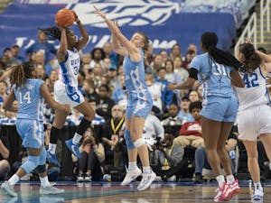 UNC junior guard Alyssa Ustby (1) tries to block a shot during the women’s basketball game in the third round of the ACC tournament in Greensboro, N.C., on Friday, March 3, 2023. UNC fell to Duke 40-44.