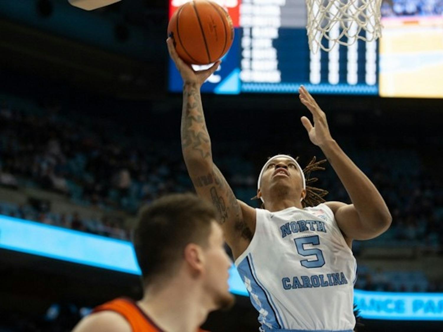 Junior forward Armando Bacot (5) puts the ball up at the game against Virginia Tech on Jan. 24, 2022 at the Smith Center. UNC won 78-68.