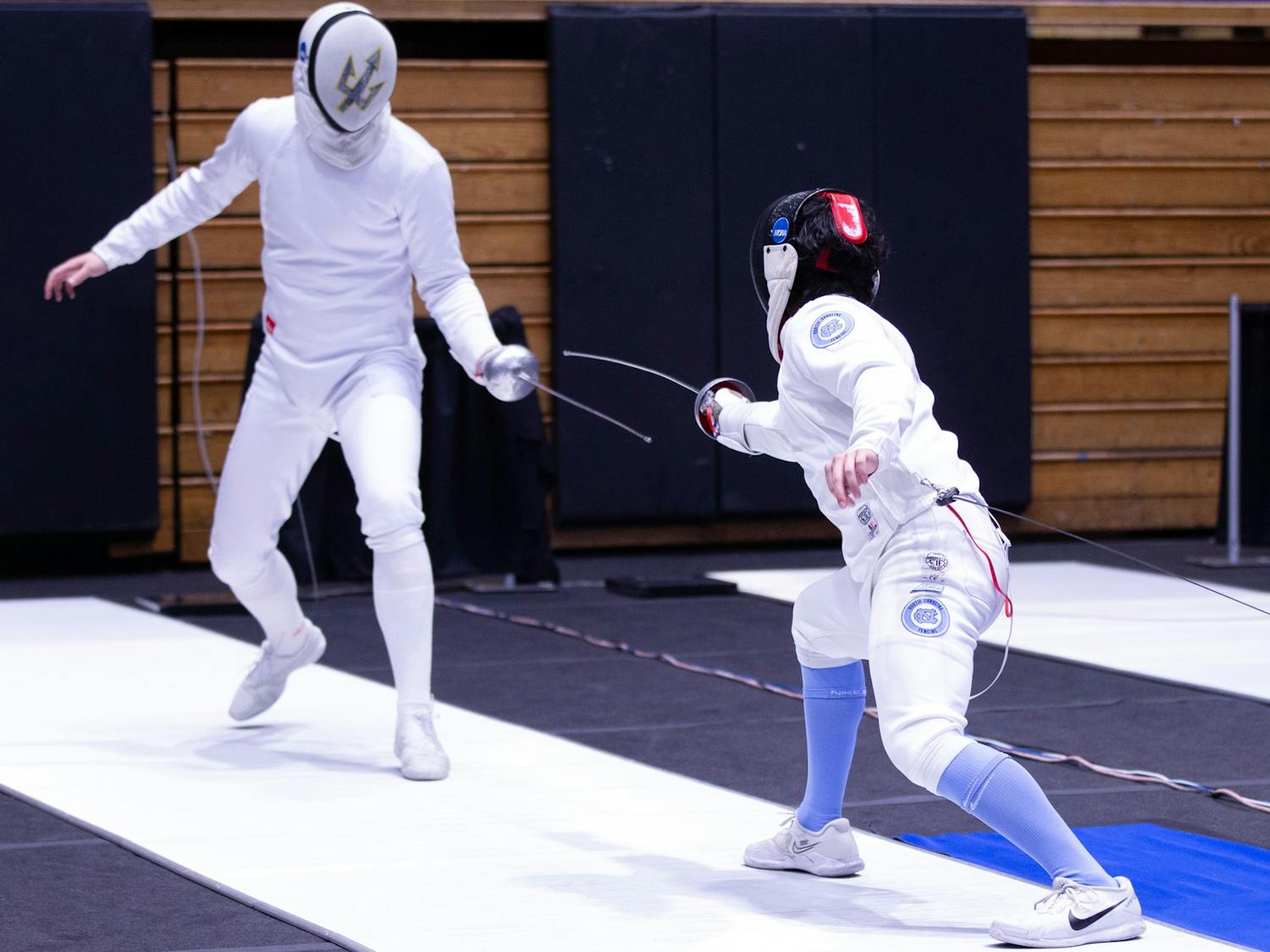 UNC sophomore epee/right hand Eli Lippman fences during the NCAA Fencing Championships at Cameron Indoor Stadium in Durham, N.C. on Friday, March 24, 2023.