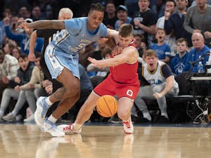 UNC senior forward/center Armando Bacot (5) steals the ball from Ohio State during the men's basketball game against Ohio State at Madison Square Garden on Saturday, Dec. 17, 2022. UNC beat Ohio State 89-84.