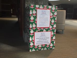 A donation bin for the UNC Children's Hospital Toy Drive sits at the main entrance of the UNC Friday Center on Sunday, Nov. 18, 2018. The drive began on Nov. 14th and will continue accepting donations until Dec. 14th. 