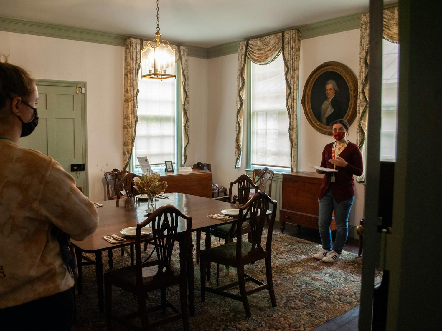 Sarah Waugh of the UNC class of 2020 gives a tour inside of the Burwell School Historic Site in Hillsborough, N.C.