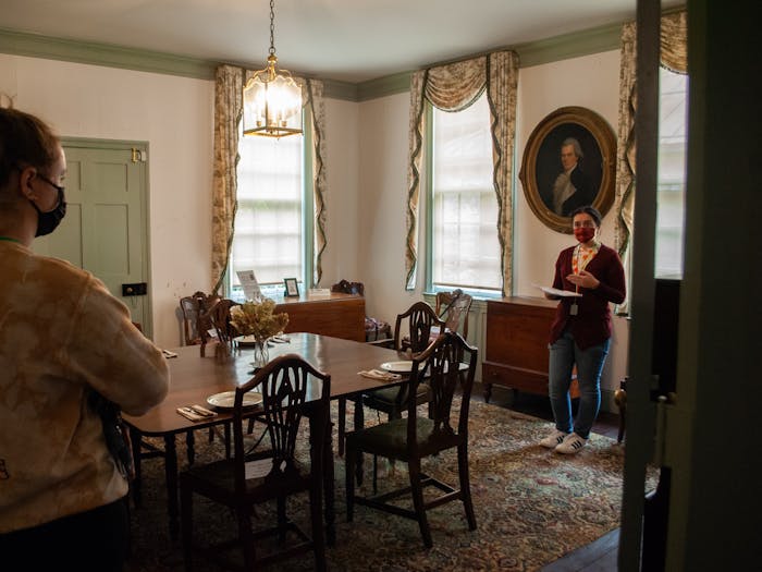 Sarah Waugh of the UNC class of 2020 gives a tour inside of the Burwell School Historic Site in Hillsborough, N.C.