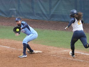 A routine infield hit received by First base Kiersten Licea(1) to get runner  Natalia Rodriguez(21) out to end the game. North Carolina defeated Michigan 4-2 Sunday, February 17th, 2019 at Anderson Softball Stadium in Chapel Hill, North Carolina.