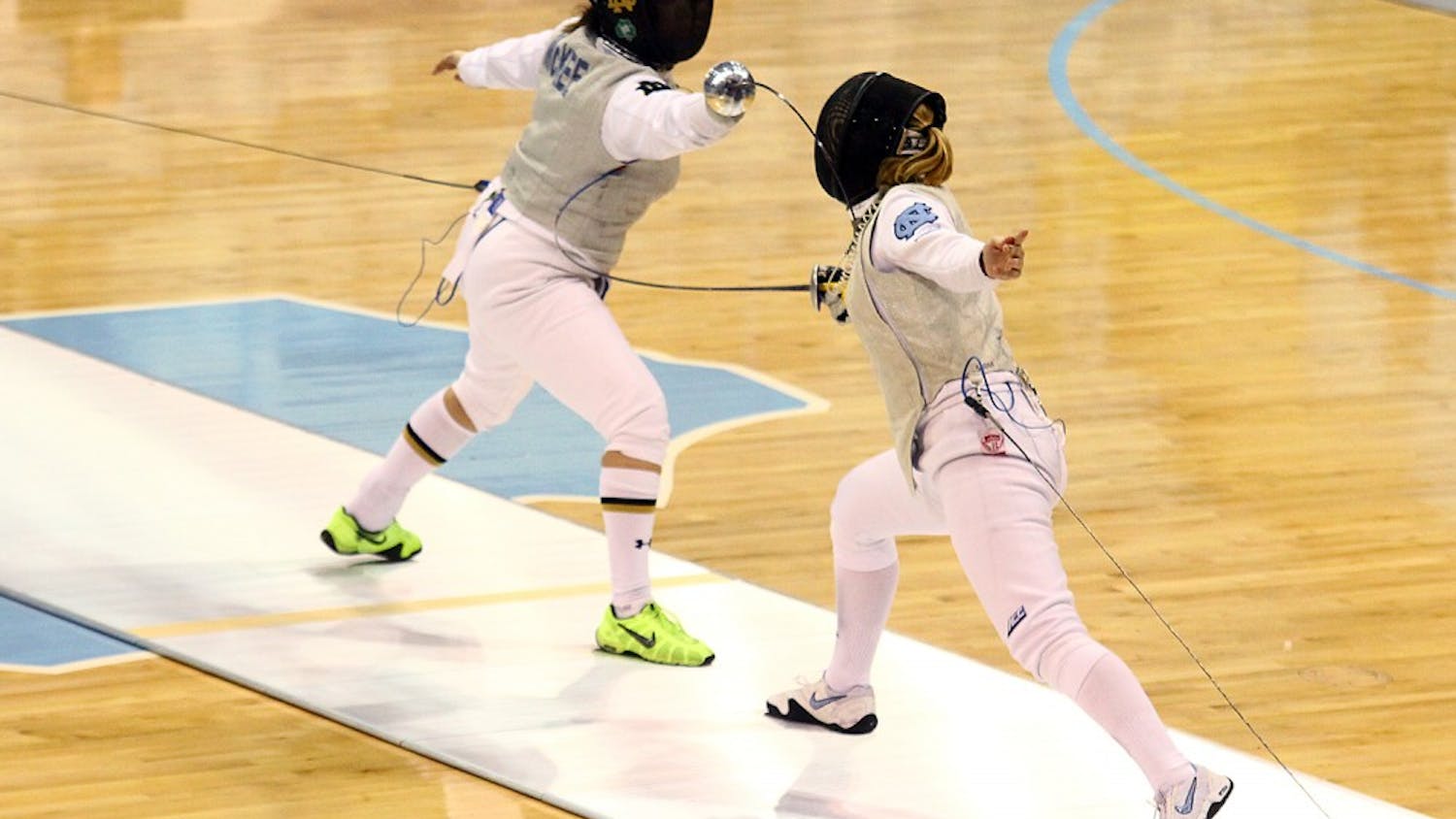Gabrielle D'Astoli (right) competes in the first ACC Women's Fencing Championship Sunday.