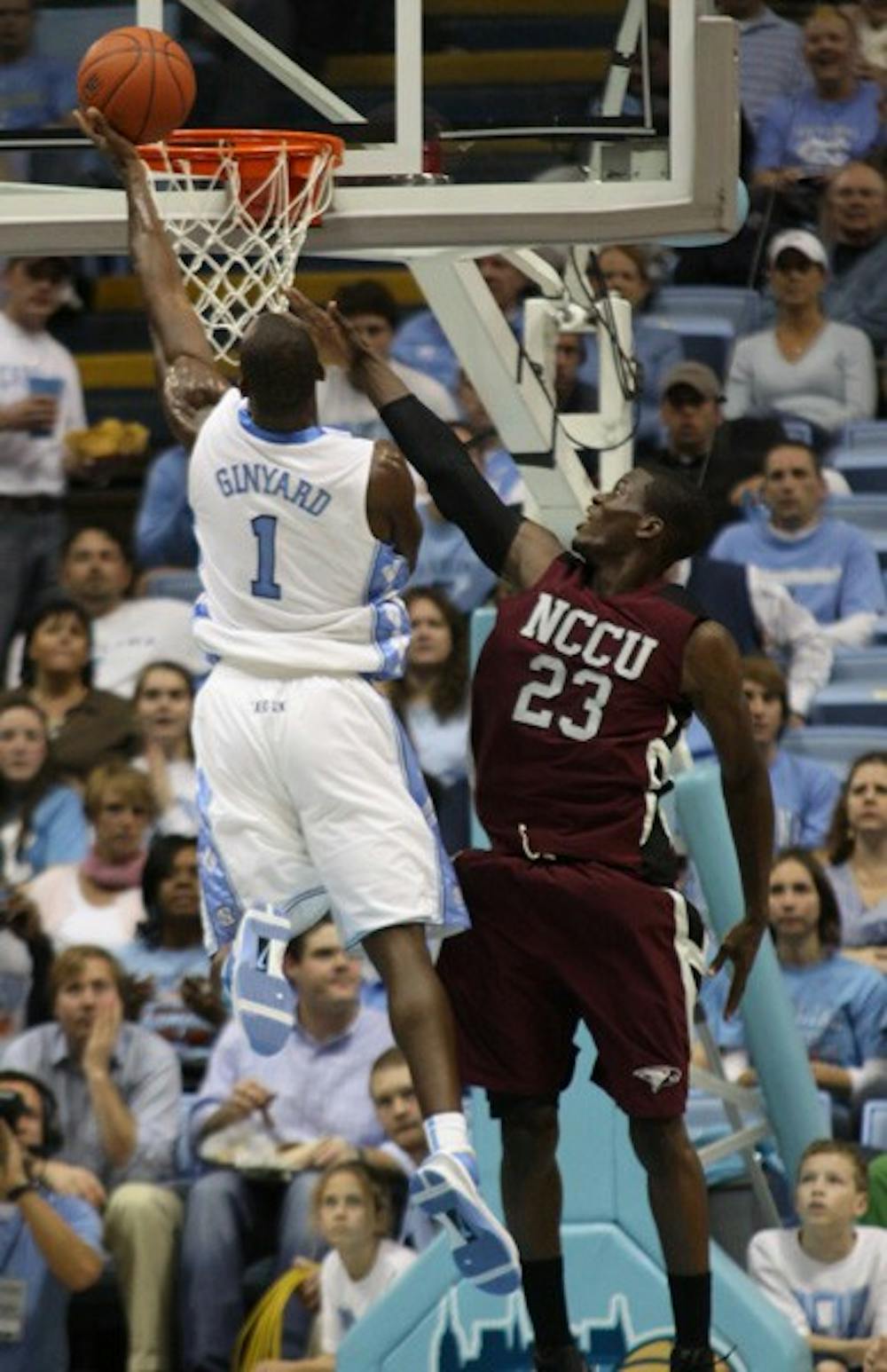 Senior Marcus Ginyard lays in two of his 17 points over N.C. Central’s Dami Sapara. DTH/Margaret Cheatham Williams