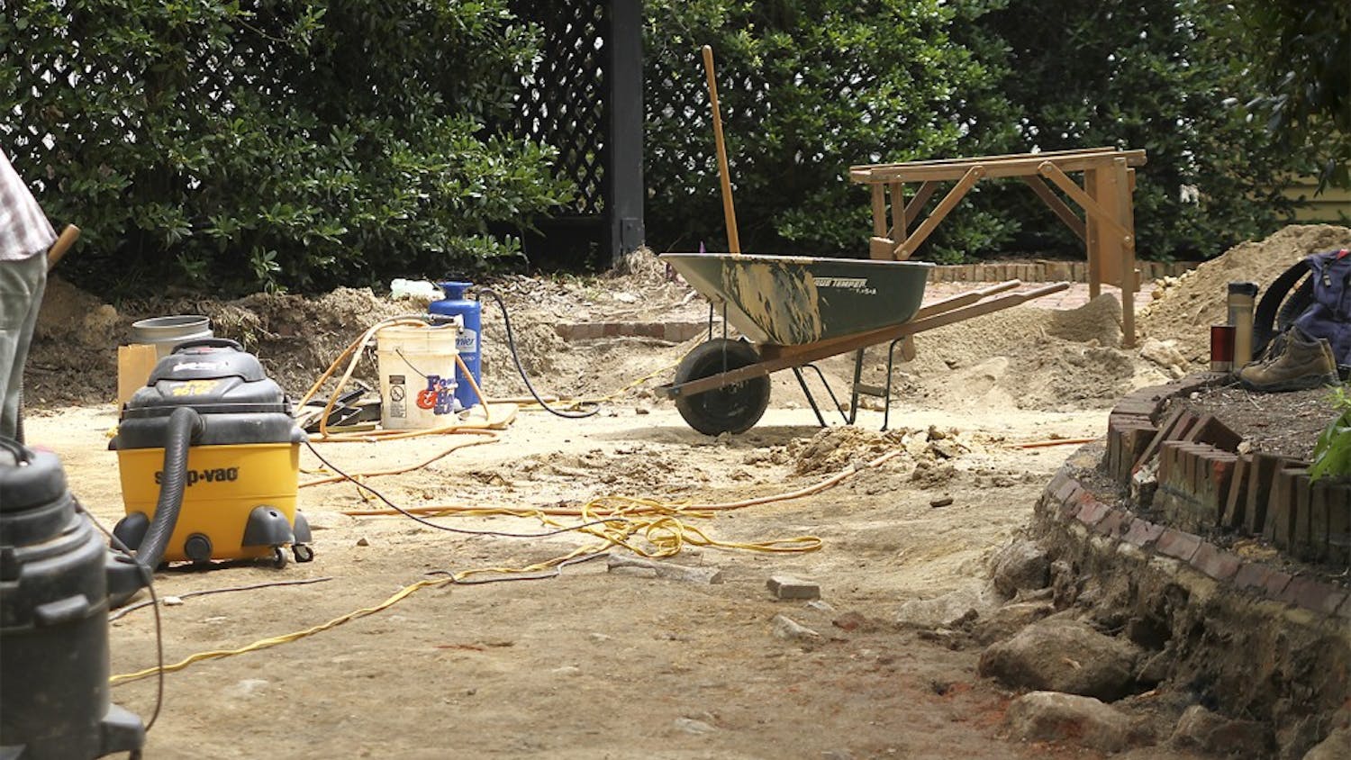 While doing construction work at UNC President Tom Ross's house on Franklin Street the remains of the original house were discovered under the driveway. Professors and graduate students from UNC's Research Laboratories of Archaeology work to unearth ruins from the site.