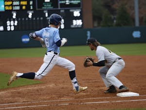 Sophomore Dylan Enwiller (6) just misses a chance at a single during UNC 11-8 loss over VCU on Wednesday.
