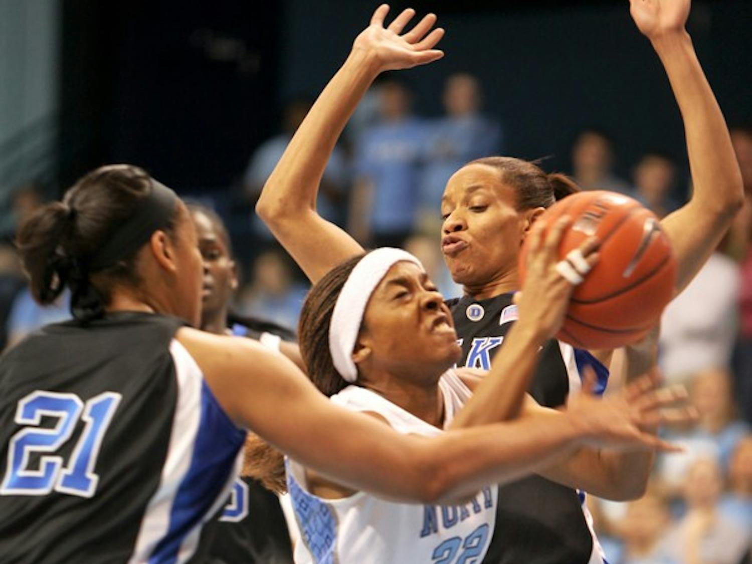 Cetera DeGraffenreid fights through two defenders in Sunday’s 64-54 win against Duke. DTH/Phong Dinh