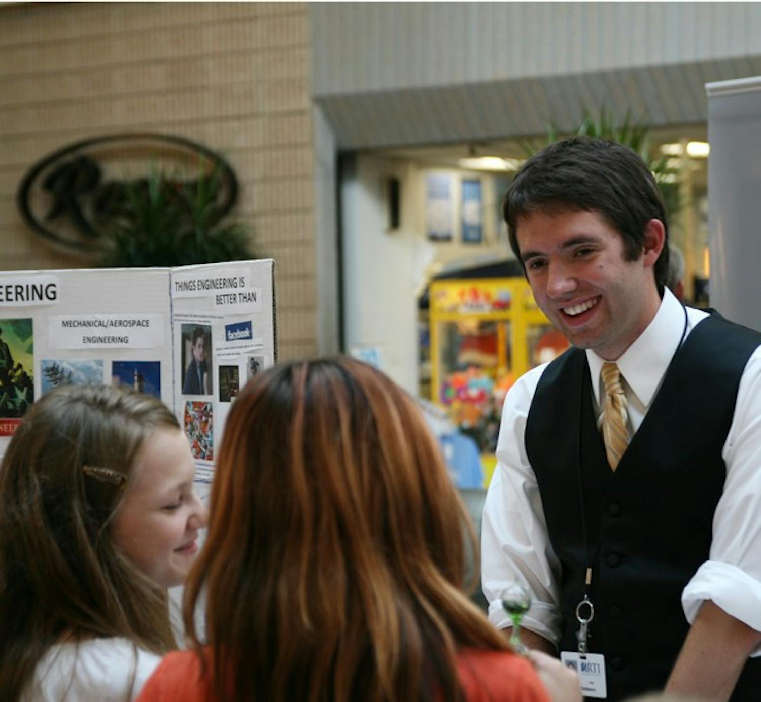 Nick Baldasaro speaks to Chapel Hill-Carrboro City Schools students about being an engineer at the 2010 Career Expo at University Mall.