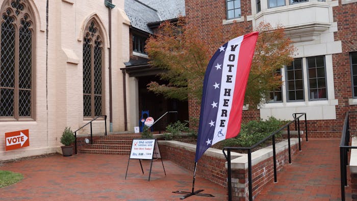 Signs outside Chapel of the Cross, an early voting location, point residents towards the front door on Monday, Oct. 31, 2022.