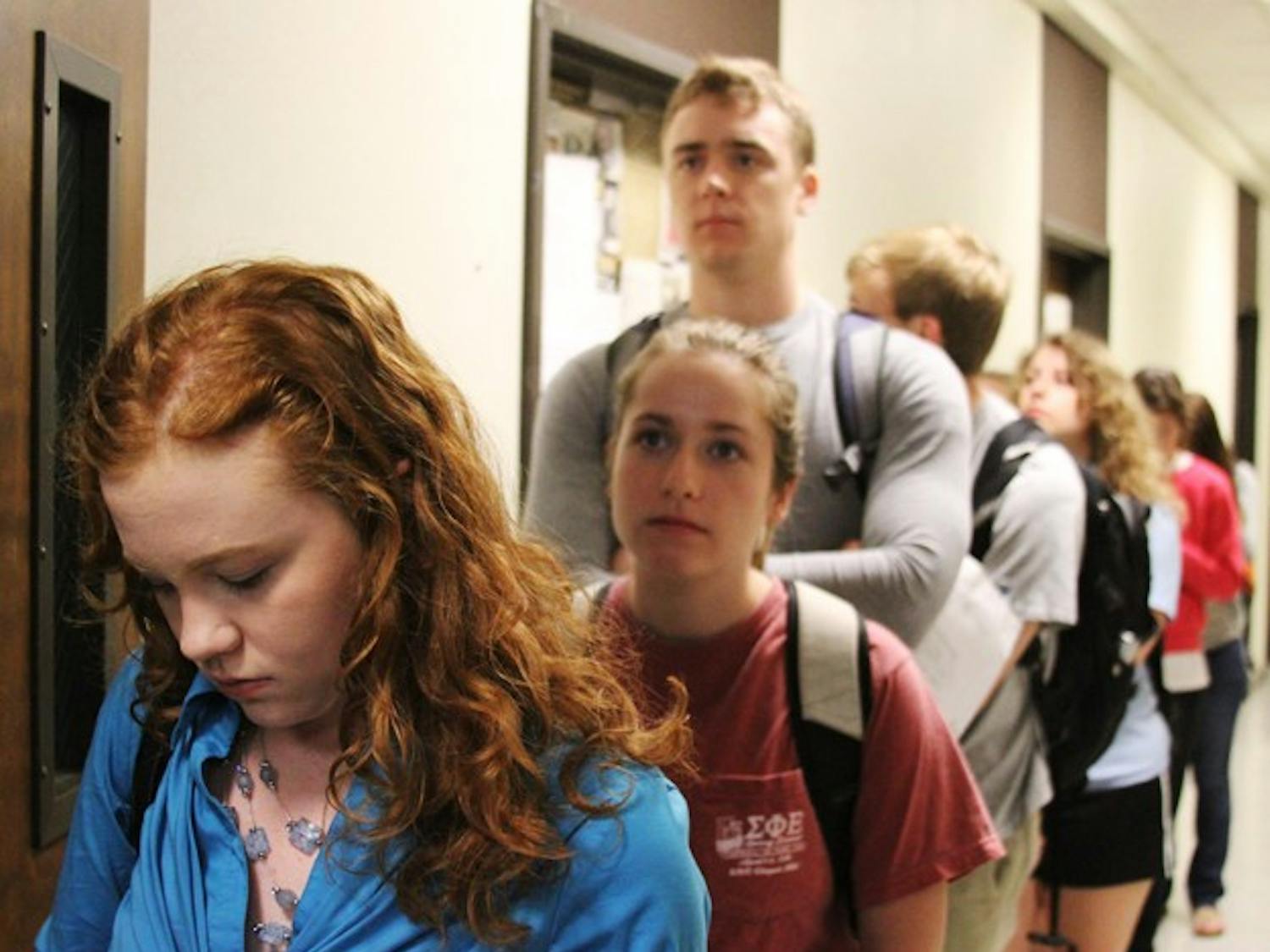 Photo: History majors line up as early as 5:15 a.m. to enroll in special topics seminars (Leda Strong)