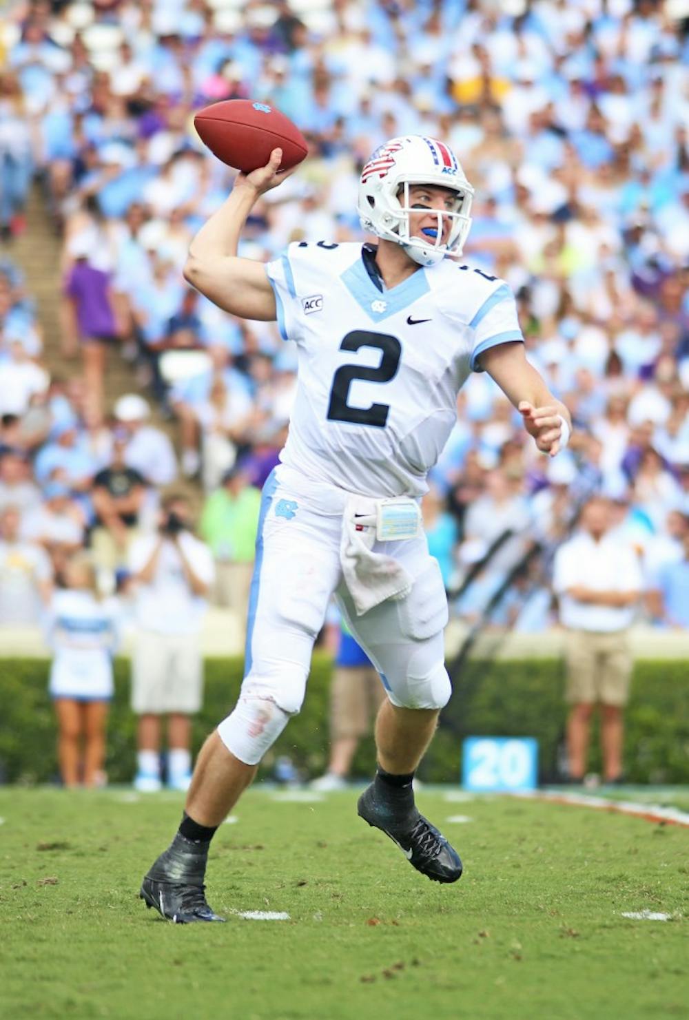 	<p><span class="caps">UNC</span> quarterback Bryn Renner (2) threw for a career high 366 yards, and also passed former <span class="caps">UNC</span> quarterback T.J. Yates.</p>