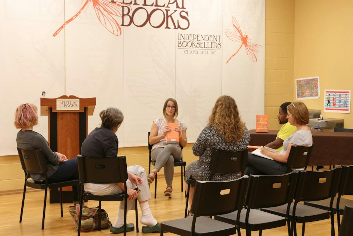 Eleanor Henderson sits with five others hosting a Q&amp;A on Wednesday night at Flyleaf books.&nbsp;