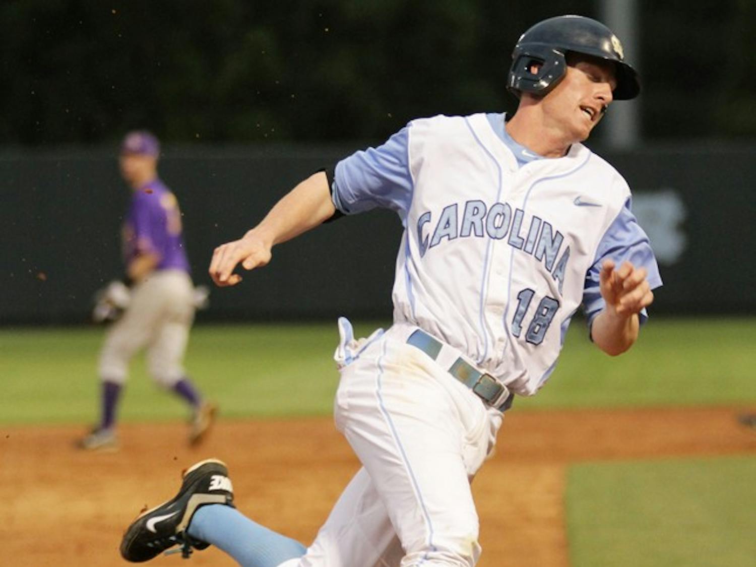 Third Baseman Colin Moran takes third and scores in the fourth inning. The Tar Heels defeated the ECU Pirates 5-3 on April 12.