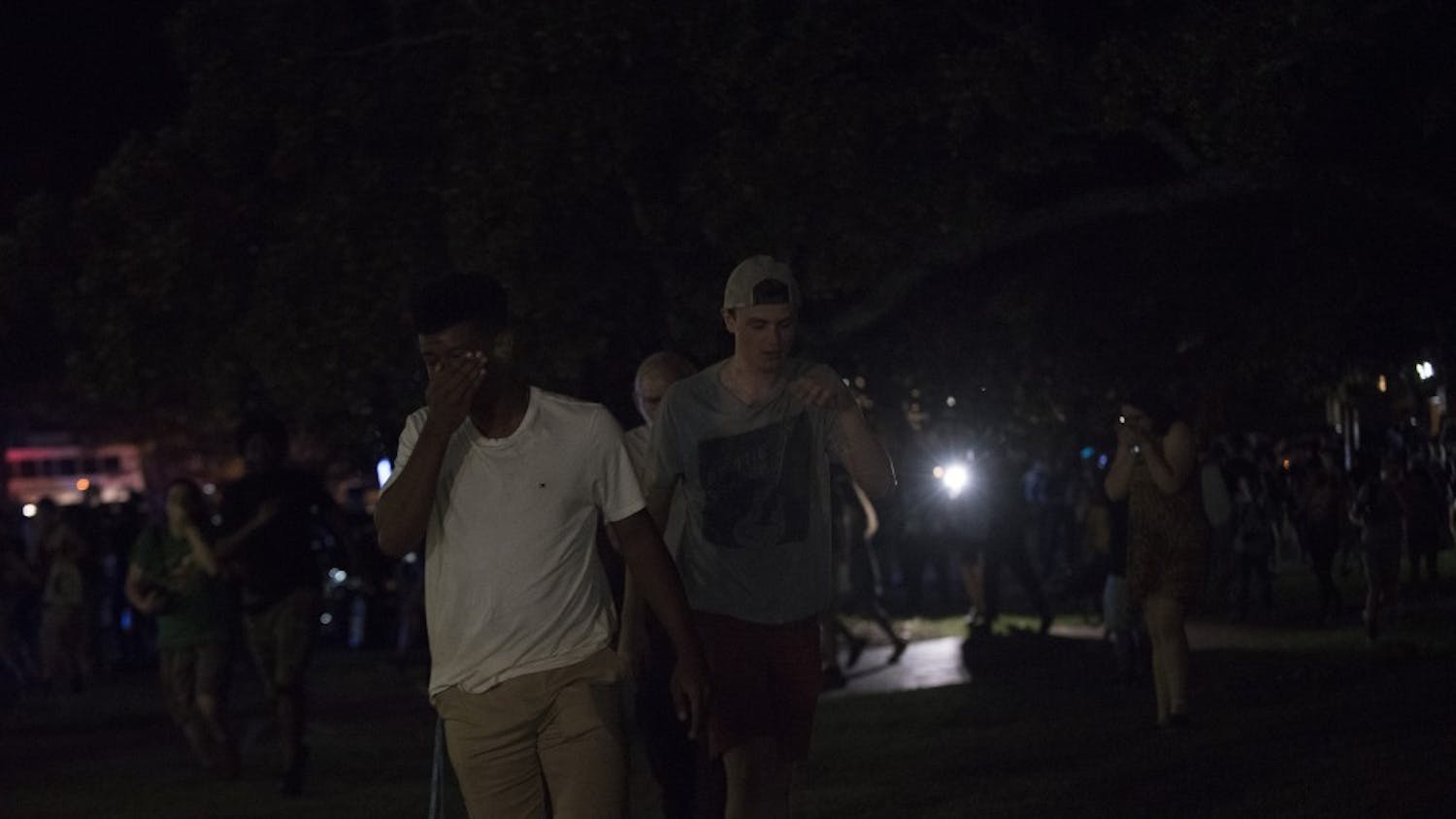 During Silent Sam twilight service and dance party, police use a pepper fogger. 