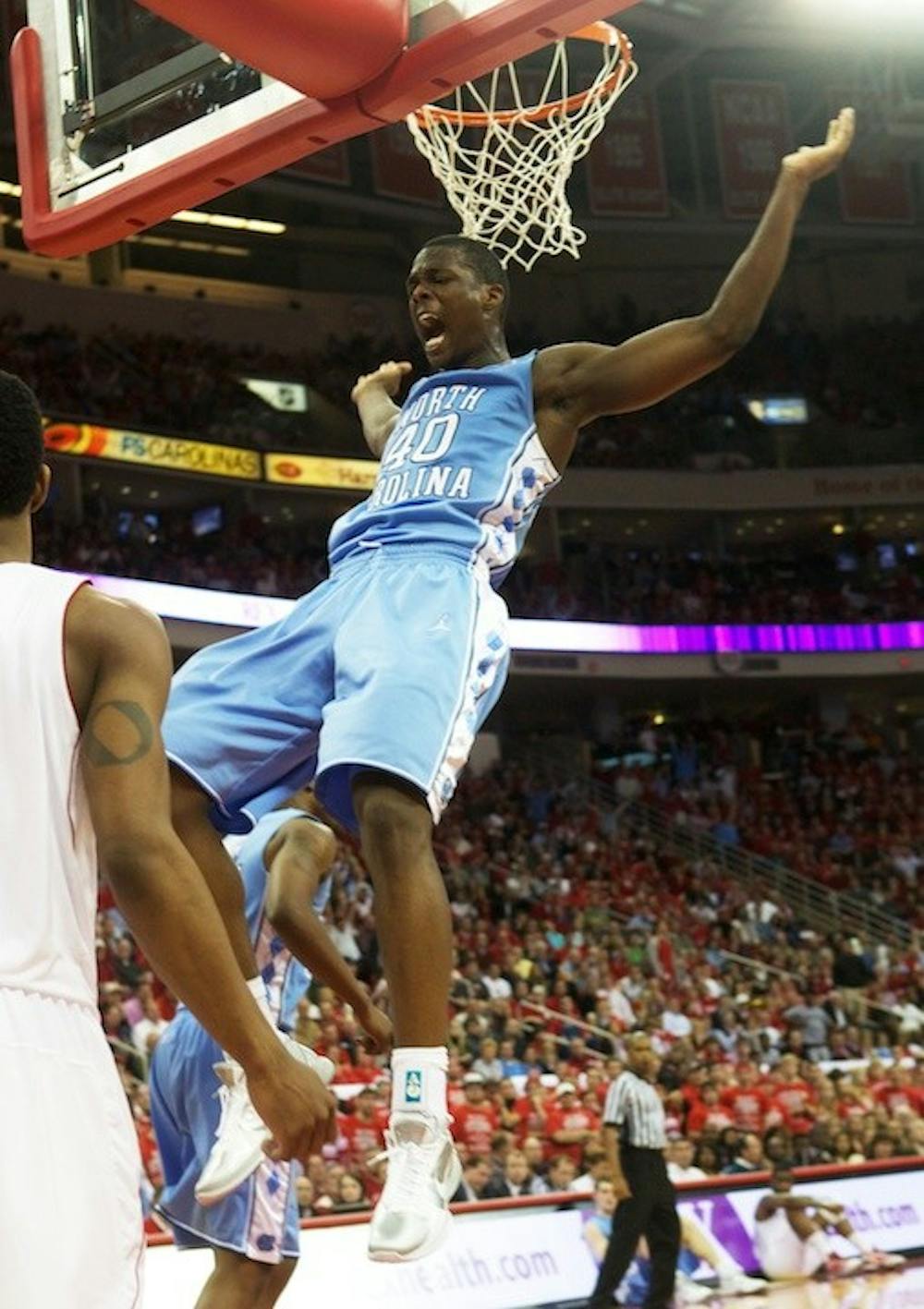 Harrison Barnes dunks late in the second half of the Tar Heels' 75-63 win over the Wolfpack.