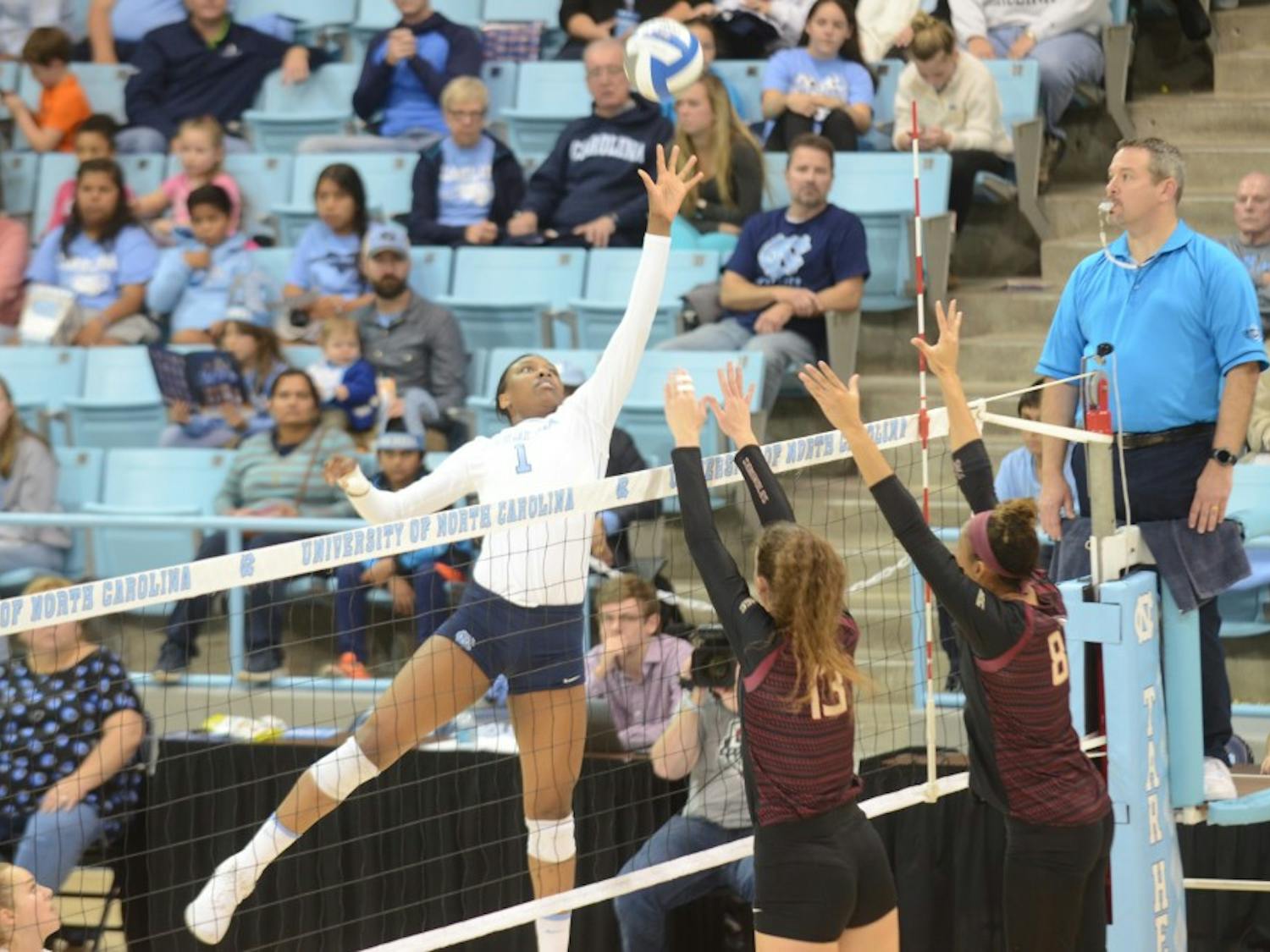 First-year outside hitter Destiny Cox (1) prepares to strike the ball during the Wednesday, Nov. 21, 2018 game against FSU. UNC lost the game 3-0. 