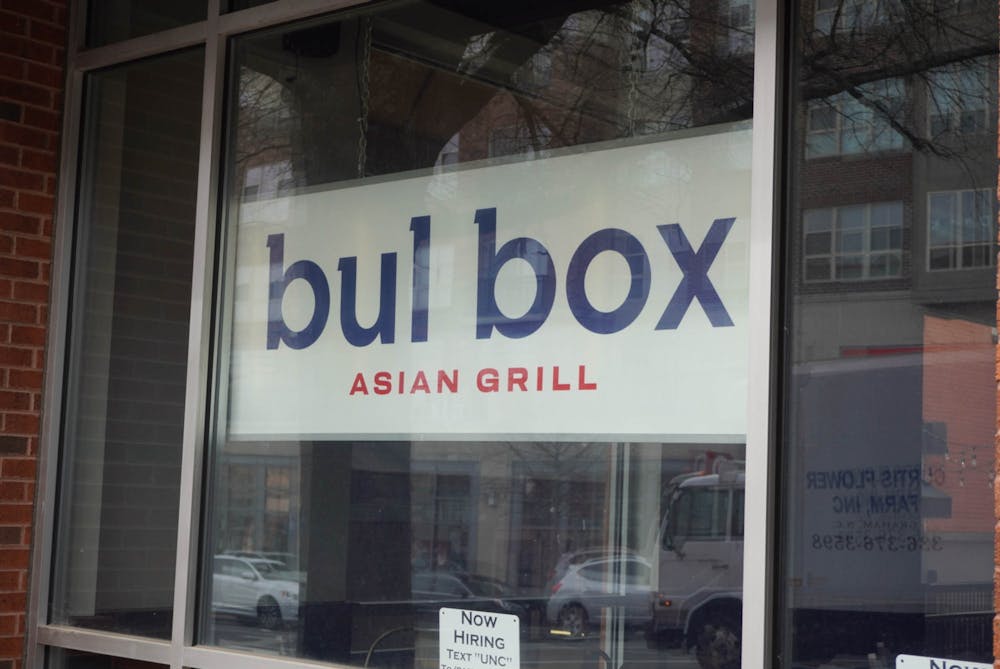 <p>Bul-Box Asian Grill sign is hung on Franklin Street on Wednesday, March 1, 2023.</p>