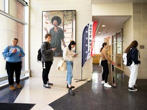 UNC students stand in line outside the voting area located in the Sonja Haynes Stone Center for Black Culture and History during election day on Tuesday, Nov. 8, 2022.