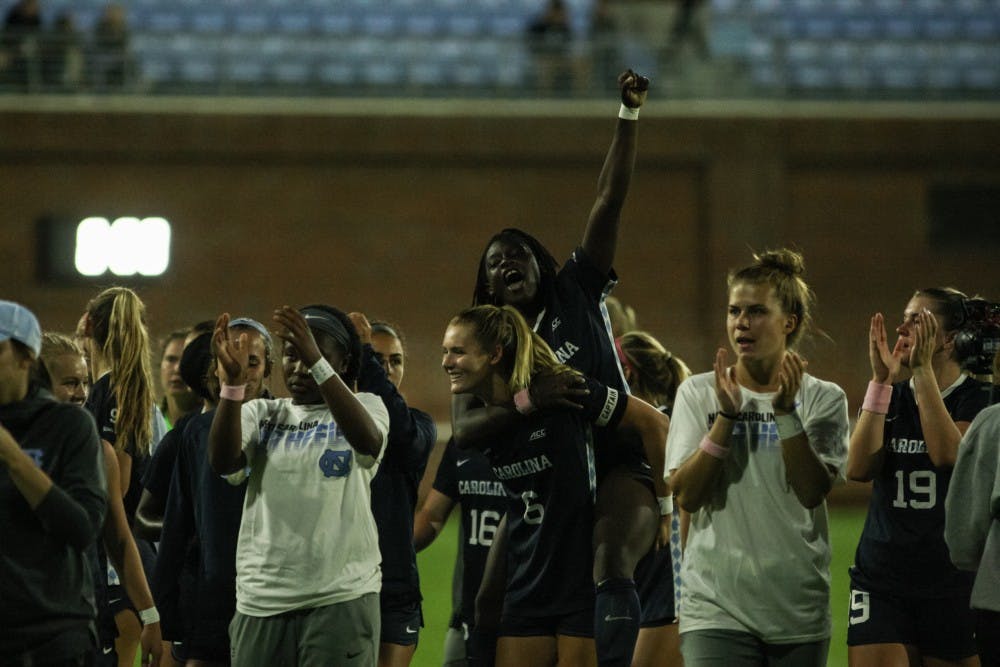 <p>The UNC women's soccer team celebrates their win against Clemson during a game on Saturday, Oct. 5th, 2019. UNC beat Clemson 1-0.</p>