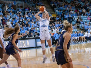 UNC junior guard/forward Alyssa Ustby (1) shoots during the women's basketball game against Notre Dame on Sunday, Jan. 8 at Carmichael Arena. UNC beat Notre Dame 60-50.