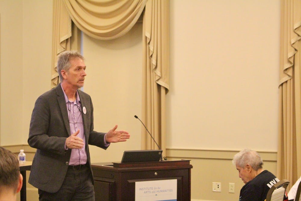 Jay Smith, a history professor at the University of North Carolina at Chapel Hill talks at the re-launching of the school's chapter of the American Association of University Professors on Friday, Oct. 9, 2018