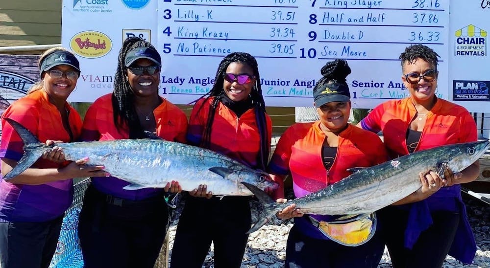 <p>The Ebony Anglers pose with King Mackerels caught for the Atlantic Beach King Mackerel Fishing Tournament in June 2020. Photo courtesy of Bobbiette Palmer.</p>