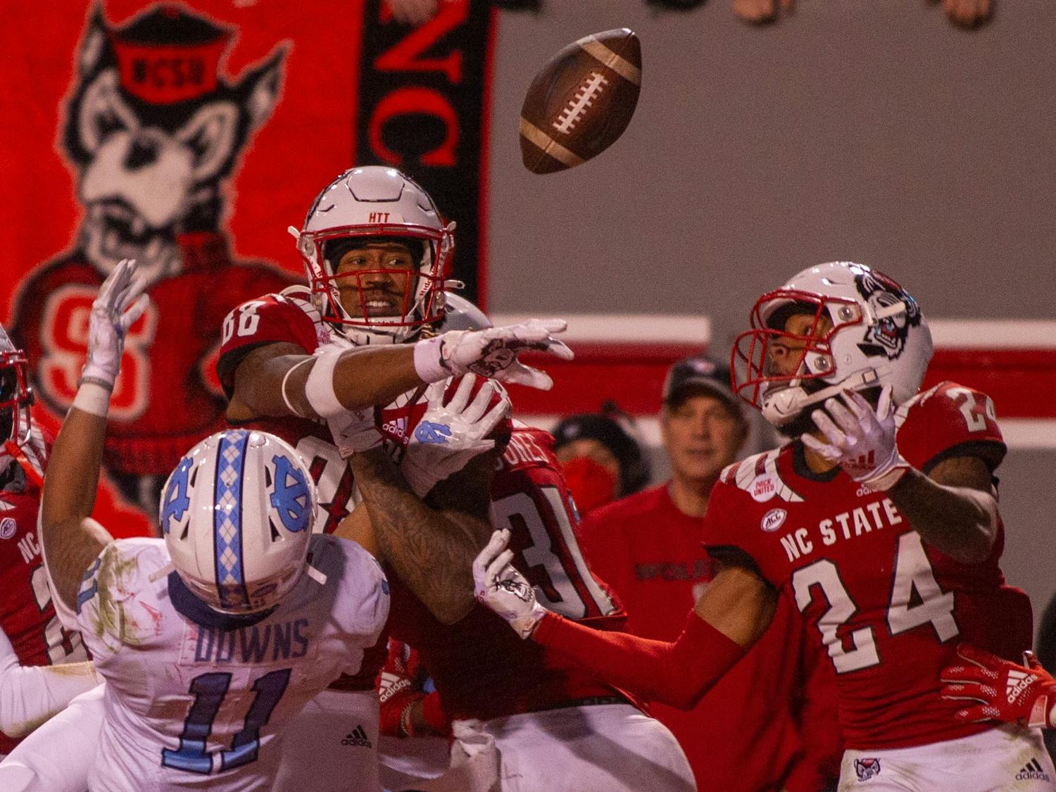 N.C. State graduate center back makes the final catch of football game against the UNC at Carter Finley Stadium in Raleigh, NC, on Friday, Nov. 26, 2021. This catch marked the final posession of the game, securing N.C. State's 34-30 victory.