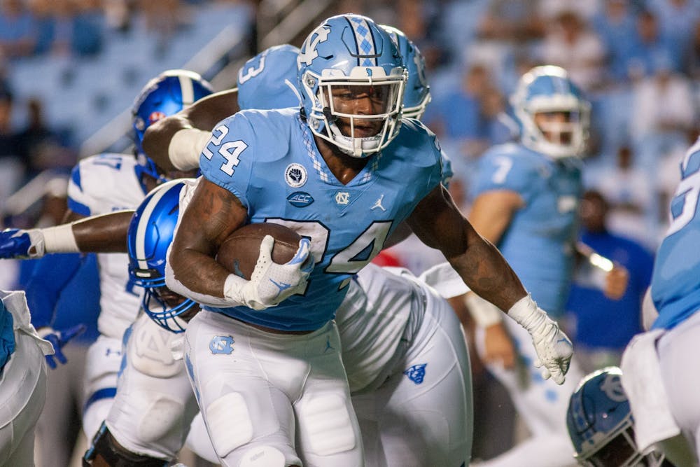 UNC senior running back British Brooks (24) carries the ball at the game against Georgia State on Sept. 11 at Kenan Stadium. UNC won 59-17.