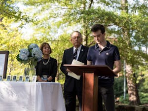 First-year student Dylan Melisaratos speaks briefly about his uncle, Chirstopher Quackenbush, who was a victim in the 9/11 terrorist attack in Memorial Garden near the Alumni Center on the morning of&nbsp;Tuesday, September 11, 2018.