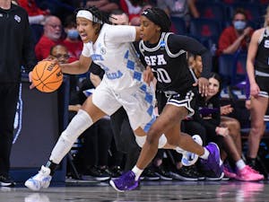 Sophomore guard Kennedy Todd-Williams (3) runs with the ball during a women's basketball game against Stephen F. Austin in Tucson, Arizona, on Saturday, March 19, 2022.