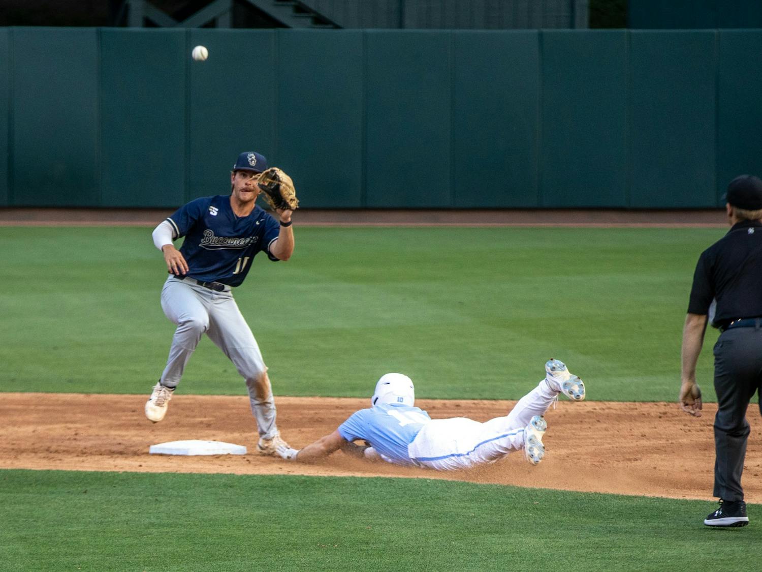 Sophomore infielder Mac Horvath (10) slides into second base during UNC's game against Charleston Southern at Boshamer Stadium on May 11, 2022. UNC won 12-1.