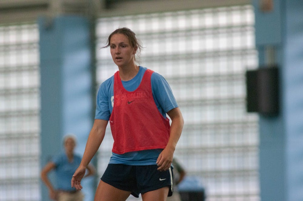 UNC women's soccer junior defender, Lotte Wubben-Moy, practices in the indoor practice facility on Monday August 19, 2019.