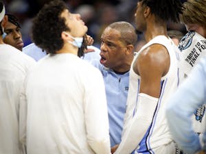 North Carolina Basketball Head Coach Hubert Davis instructs his players during the regional finals of the NCAA Tournament against St. Peter's in Philadelphia, Penn., on Sunday, March 27, 2022. UNC won 69-49.
