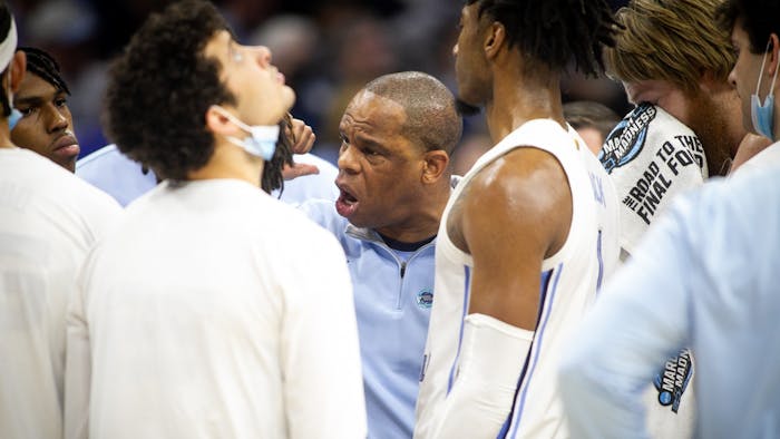 North Carolina Basketball Head Coach Hubert Davis instructs his players during the regional finals of the NCAA Tournament against St. Peter's in Philadelphia, Penn., on Sunday, March 27, 2022. UNC won 69-49.
