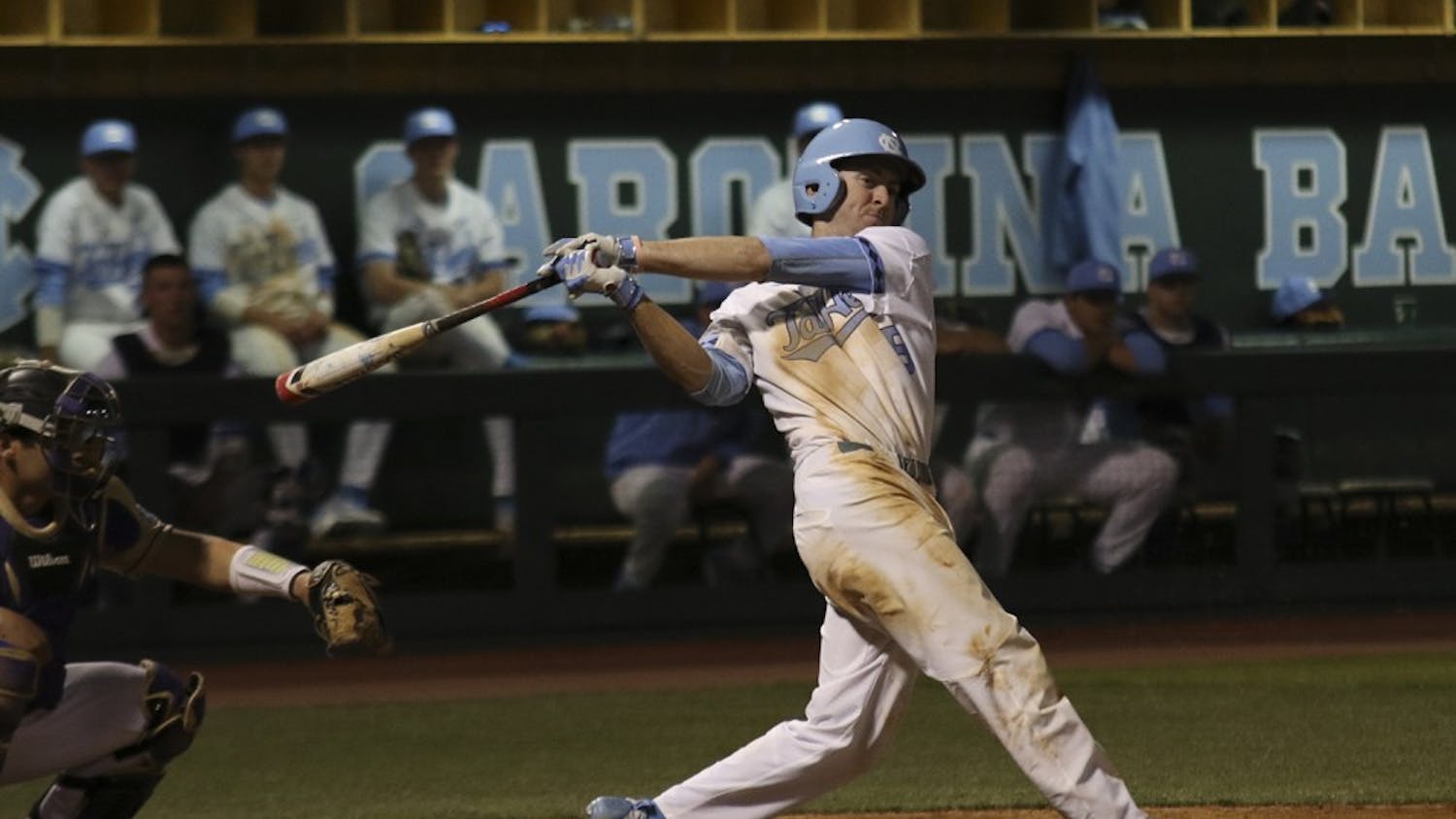 First baseman Ryan Miller (5) follow through on  swing in the bottom of the seventh inning during the North Carolina baseball team's 10-2 route of Western Carolina University on Tuesday.